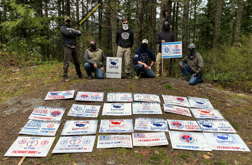 James Julius Johnson with other Patriot Front members after painting stolen signs.